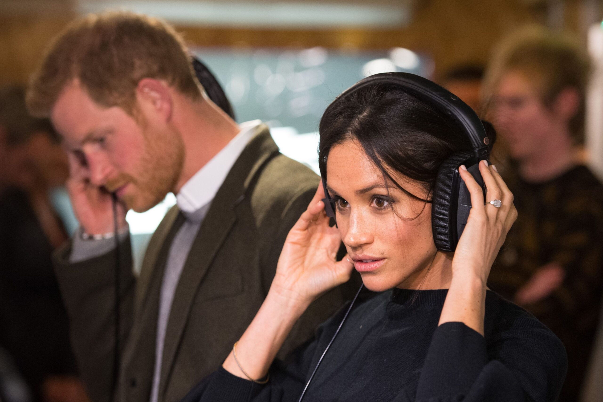 meghan-markle-listens-radio.jpg