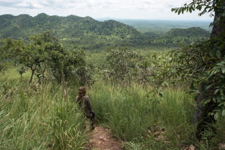 Simona-Foltyn-walks-down-a-mountain-slope-shortly-after-crossing-into-South-Sudan-1-1024x684.jpg