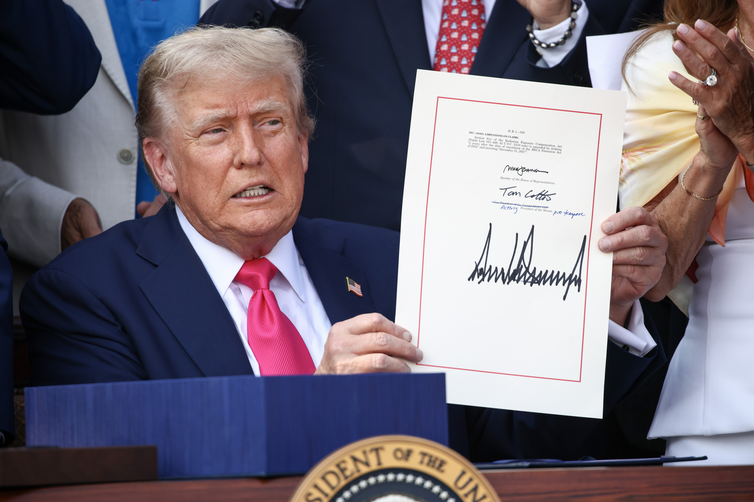 president-donald-trump-signs-law.jpg