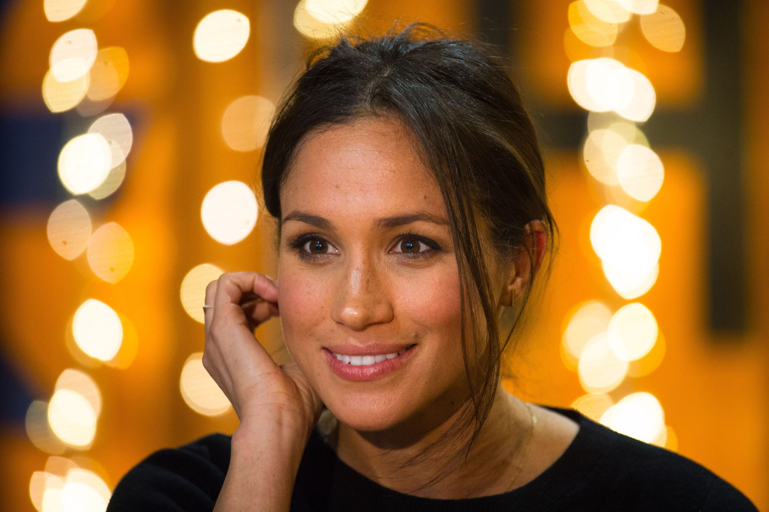 meghan-markle-smiles-front-lights.jpg