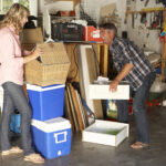 couple-clearing-garage-yard-sale.jpg