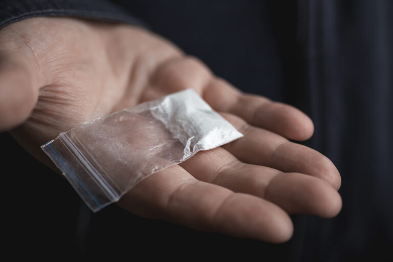 man-holding-cocaine.jpg